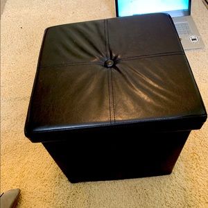 Two fold up leather ottomans